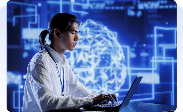 Technology professional working on a laptop with an artificial intelligence display in the background.